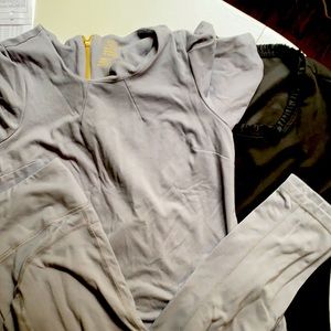 Jaanuu scrub set. Small spot of wax on black top. EUC.Only worn a couple times
